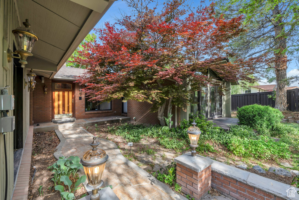 View of yard featuring fence