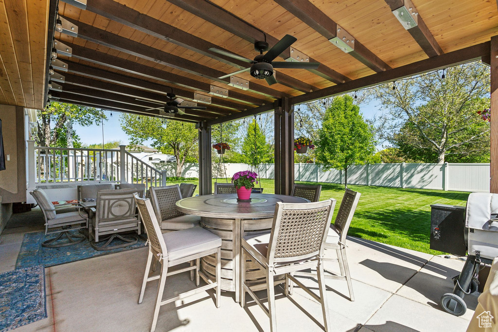 View of patio / terrace featuring a ceiling fan and outdoor dining space