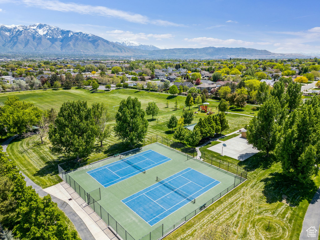 Aerial view of residential area with a mountain backdrop