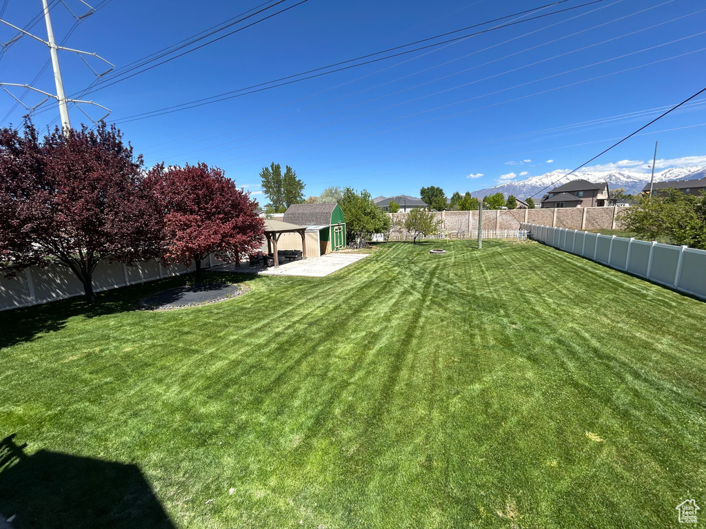 View of yard with a patio and a gazebo