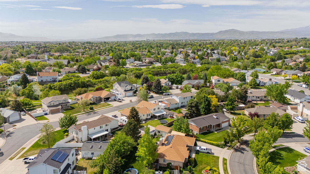 Aerial view of residential area with mountains