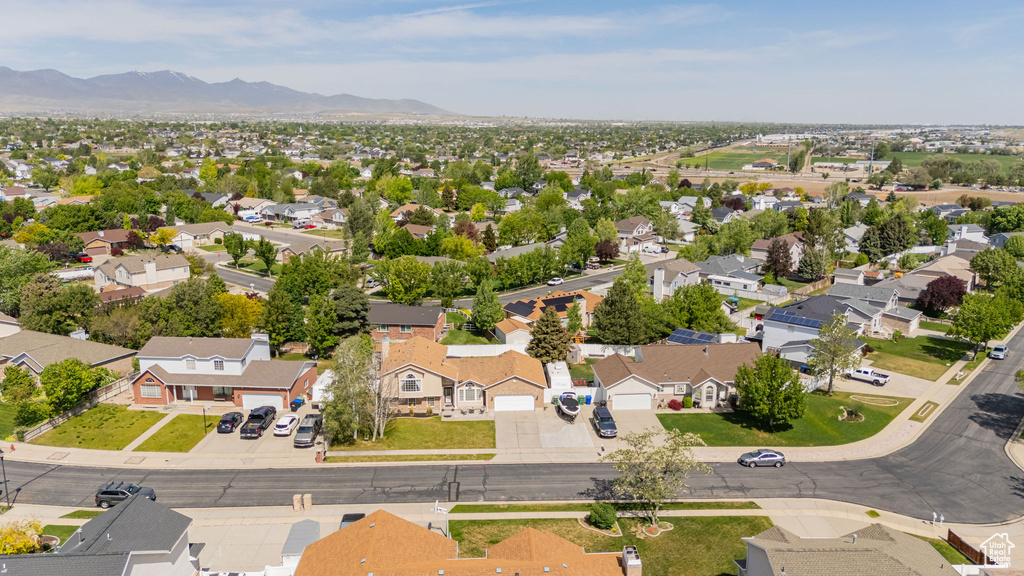 Aerial view of residential area with mountains