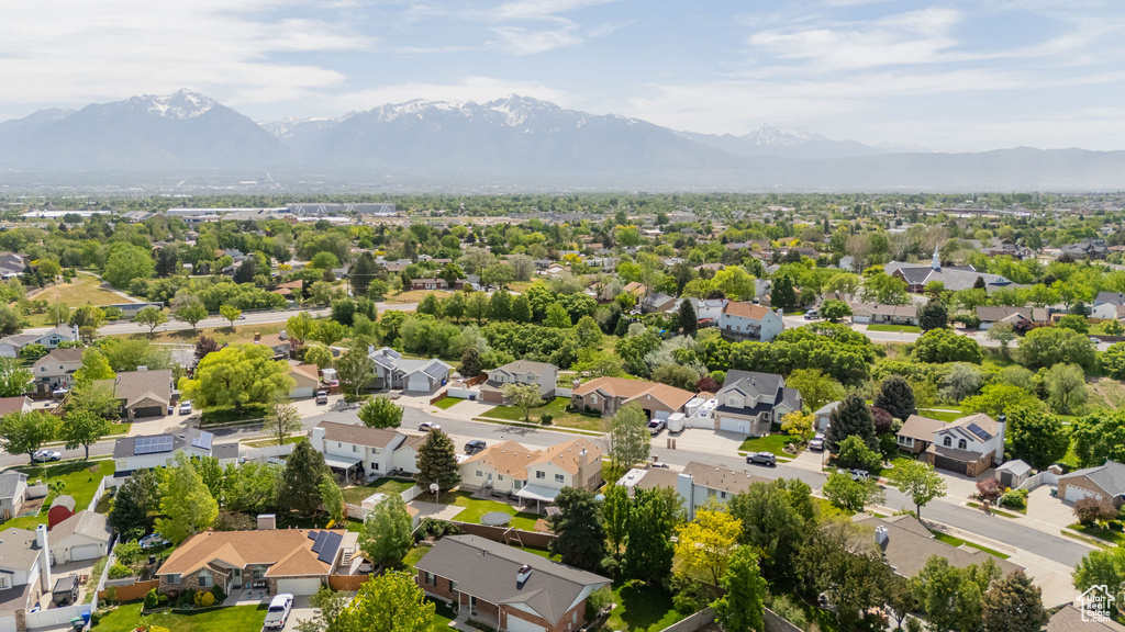 Aerial view of residential area with a mountain backdrop