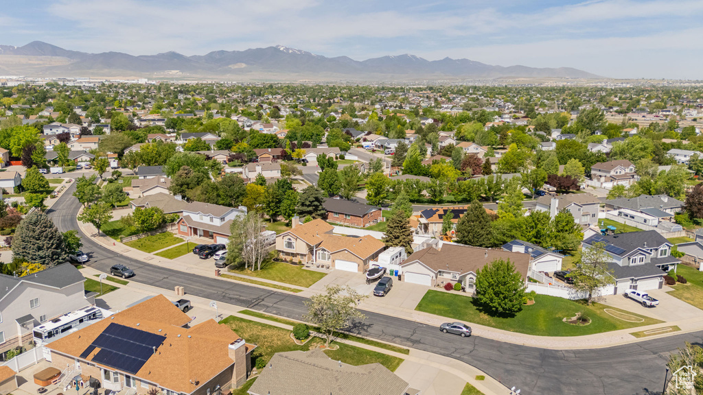 Aerial view of residential area with a mountain backdrop