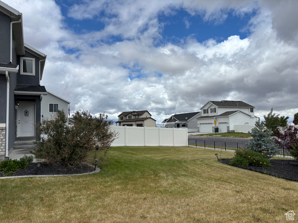 View of yard featuring a residential view