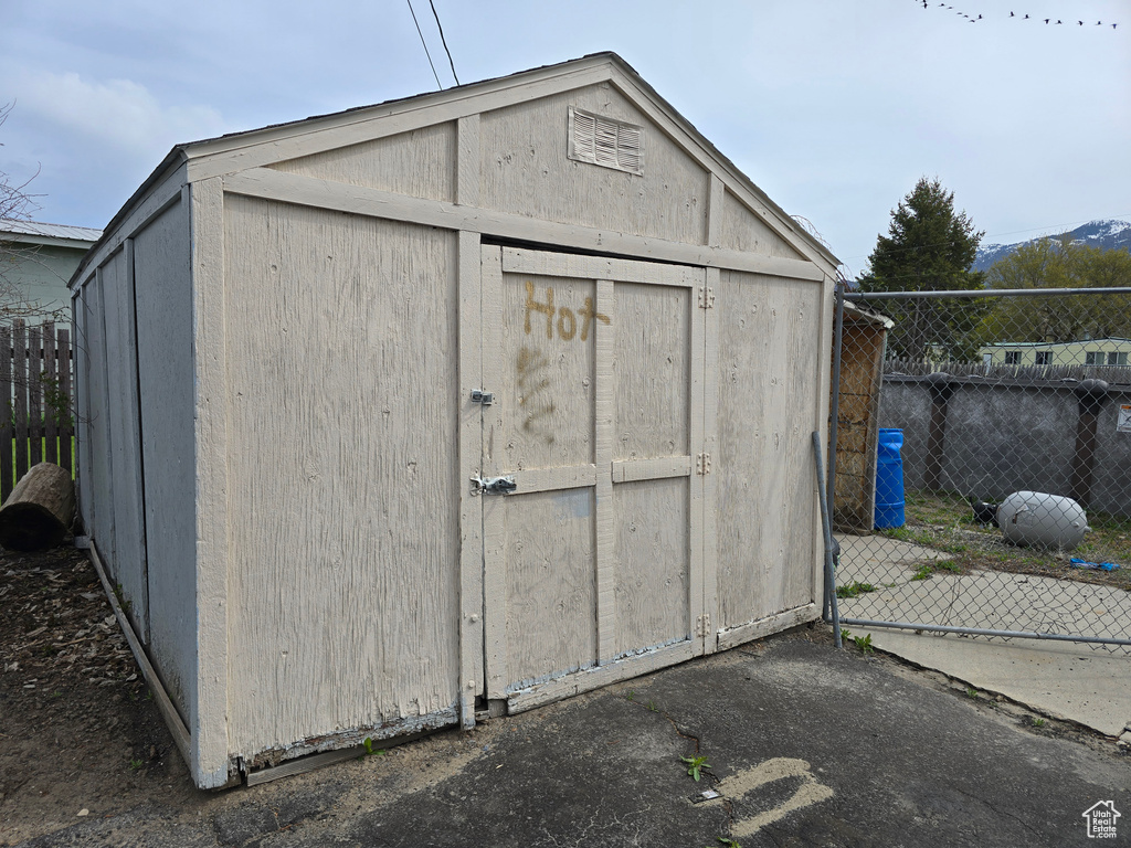 View of shed with fence