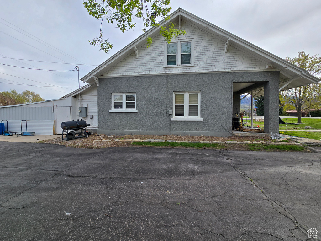 View of home\\\\\\\'s exterior featuring stucco siding