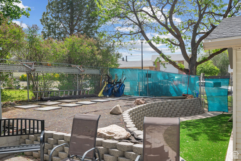 View of yard with fence