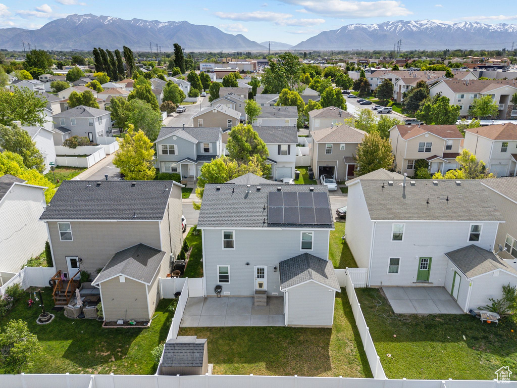 Aerial view of residential area with mountains