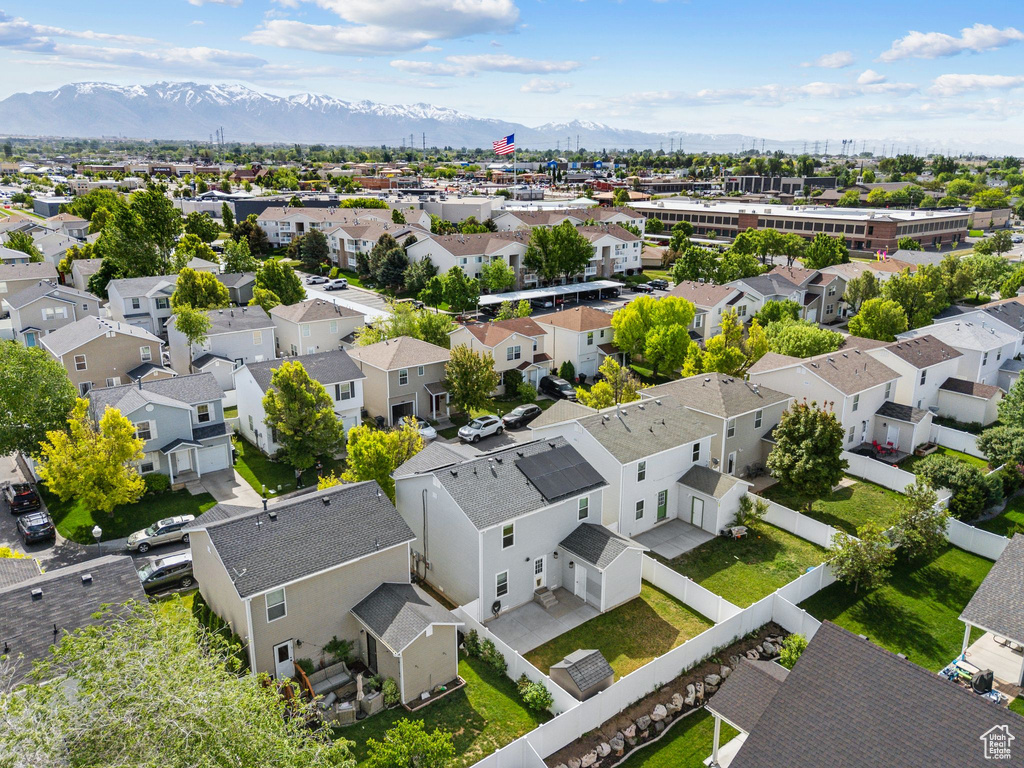 Aerial perspective of suburban area featuring mountains
