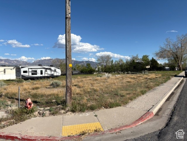 View of yard with a mountain view