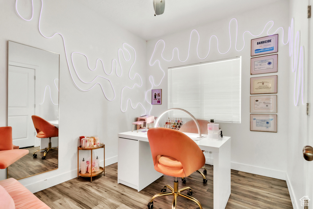 Office featuring baseboards and wood finished floors