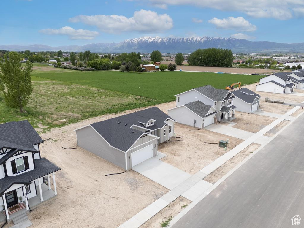View of subject property with mountains