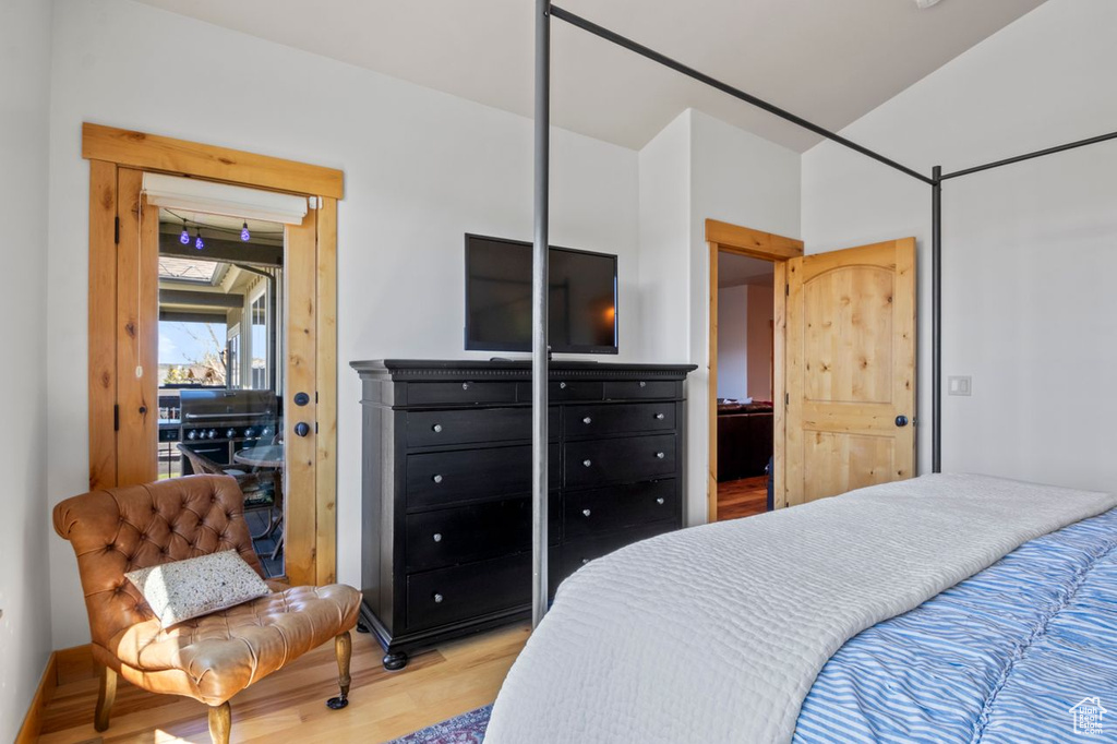 Bedroom with wood finished floors