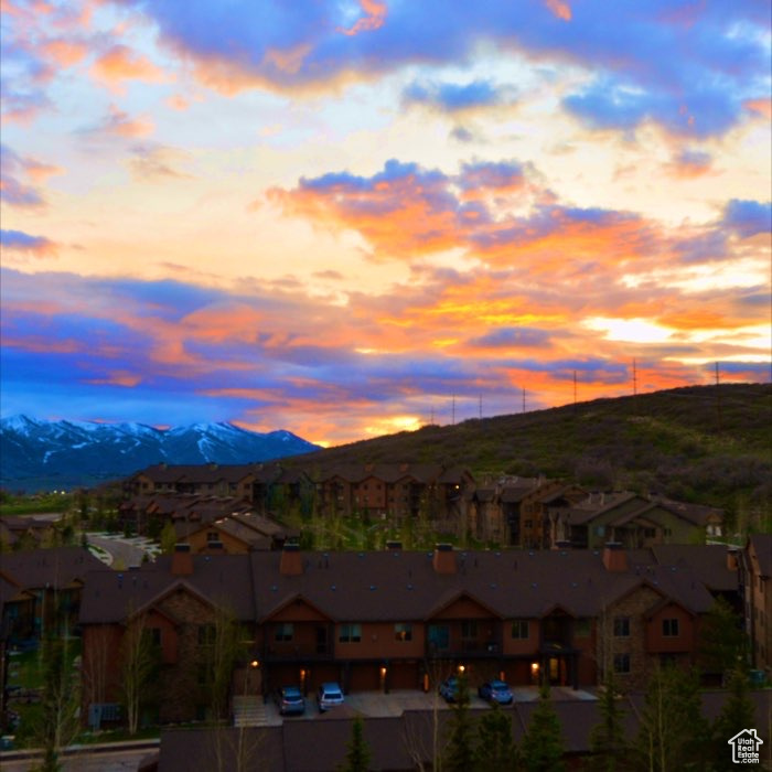 View of mountain background featuring nearby suburban area