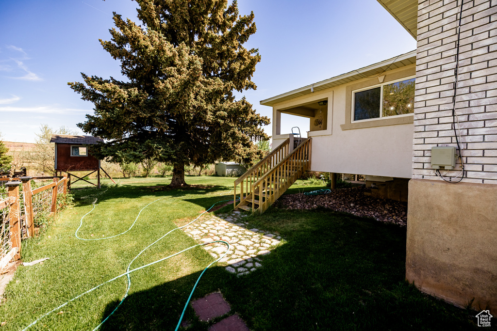 View of yard with fence