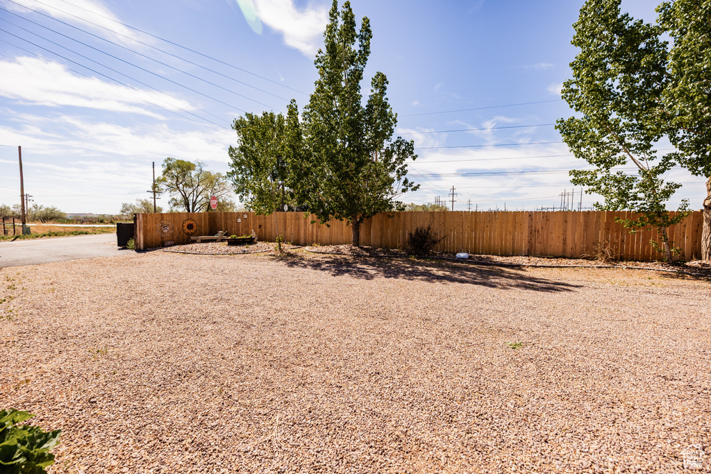 View of yard with fence