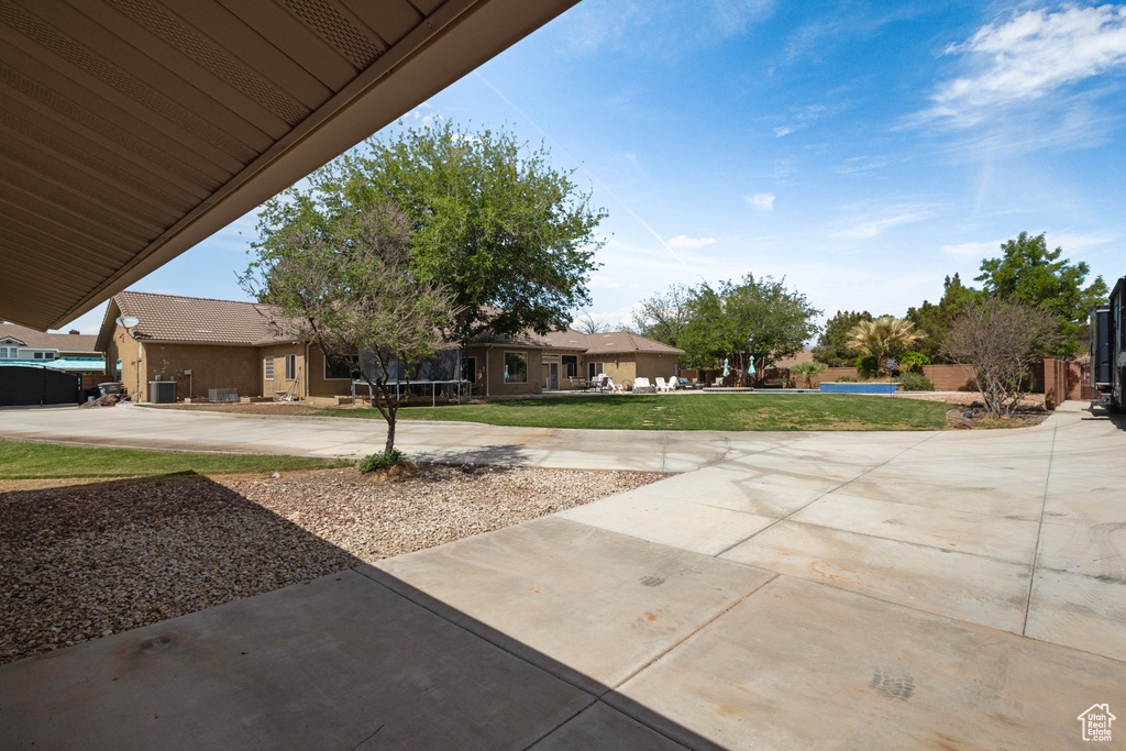 View of patio featuring cooling unit