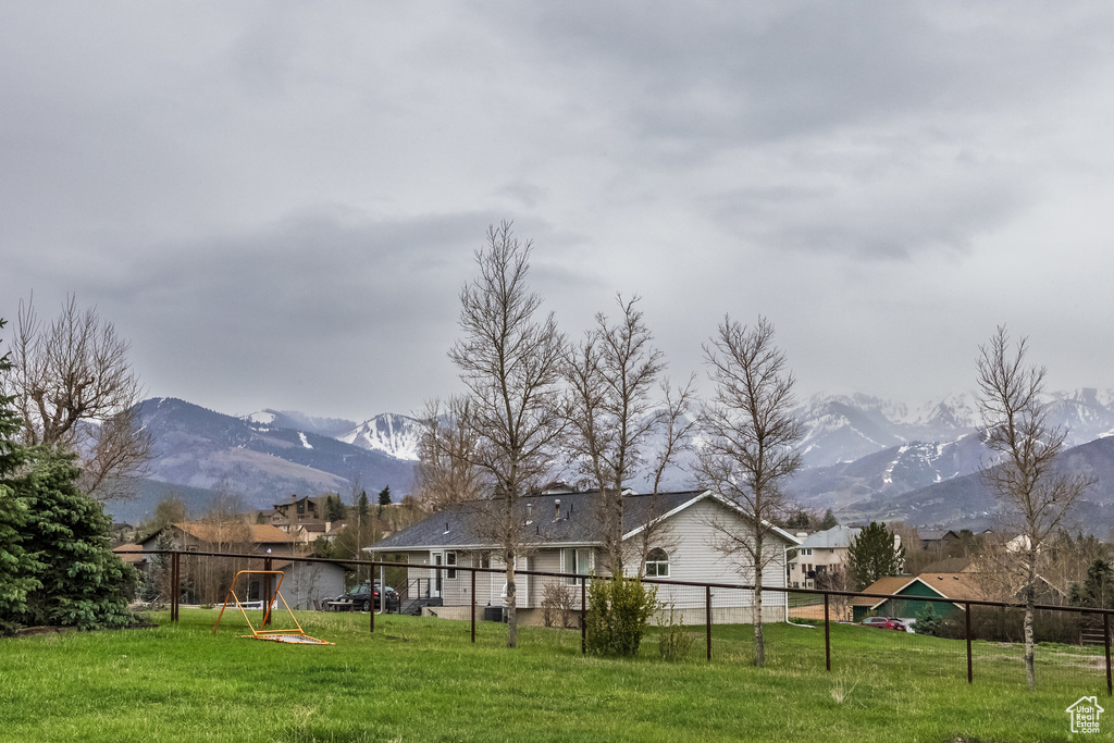 View of yard with a mountain view