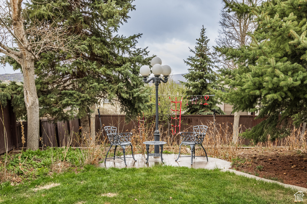 View of yard featuring fence