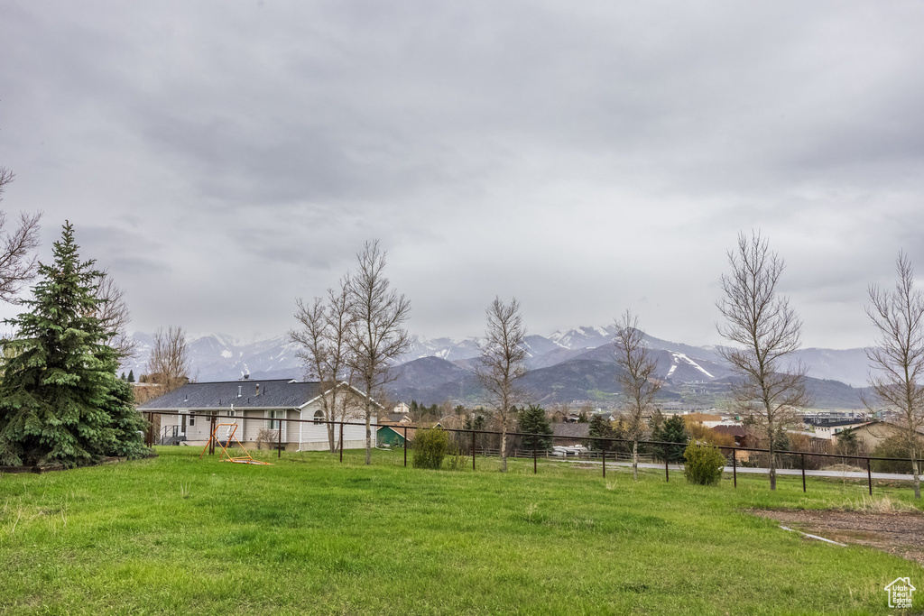 View of yard with a mountain view