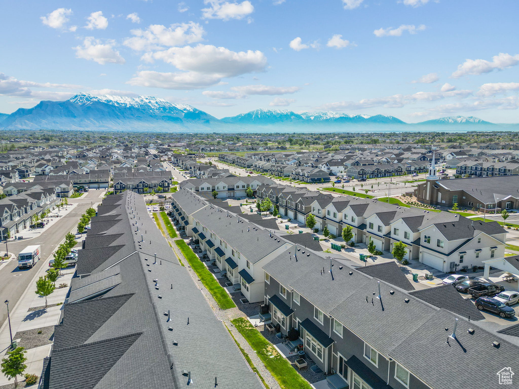 Aerial view of residential area featuring mountains