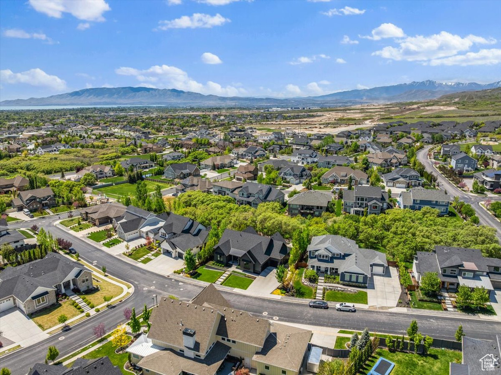 Aerial view of residential area featuring mountains