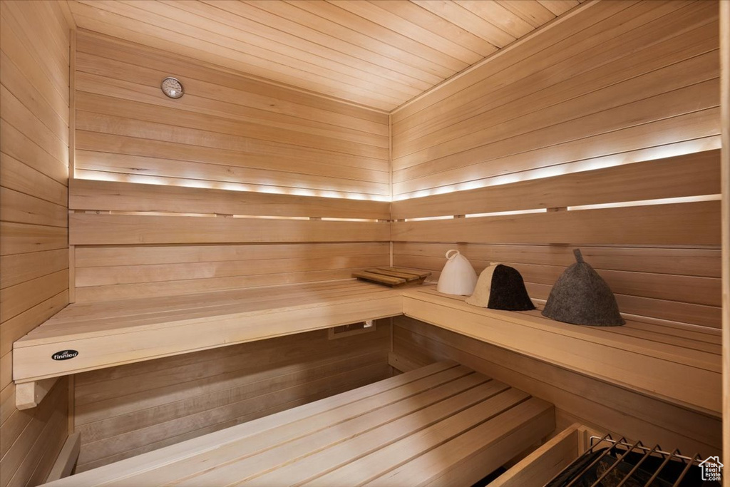 Relaxing sauna featuring wood walls