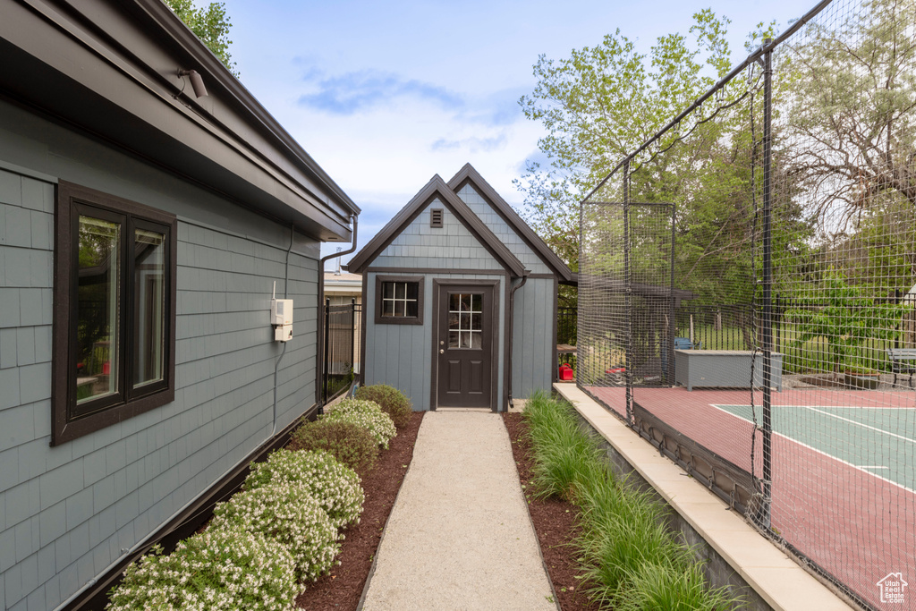 Doorway to property with fence