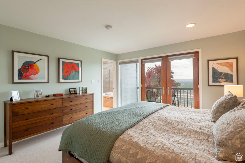 Carpeted bedroom with access to outside, french doors, and recessed lighting