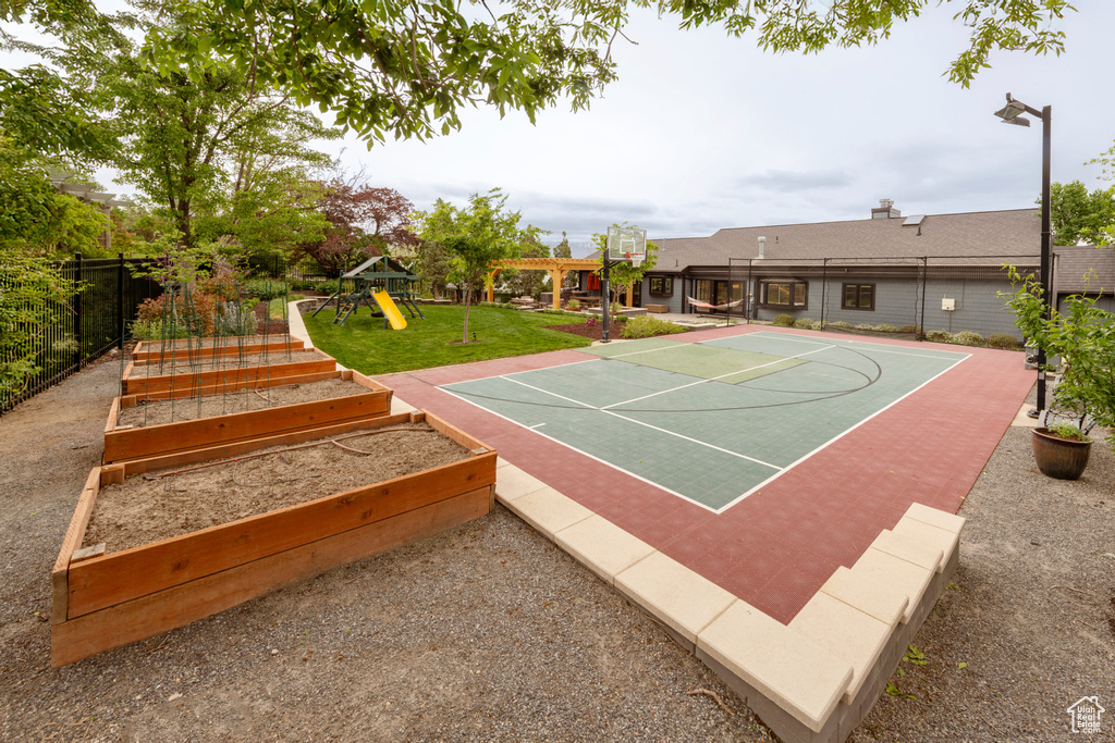 View of basketball court featuring community basketball court