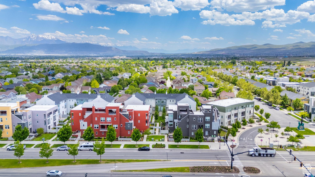 Aerial view of residential area with a mountainous background