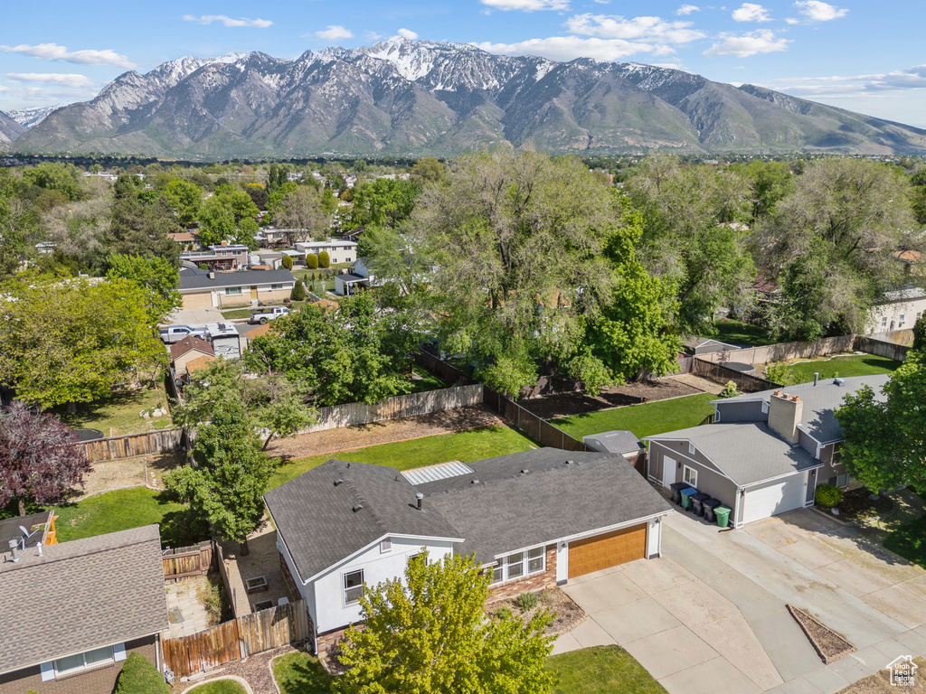 Aerial view of residential area with a mountain backdrop