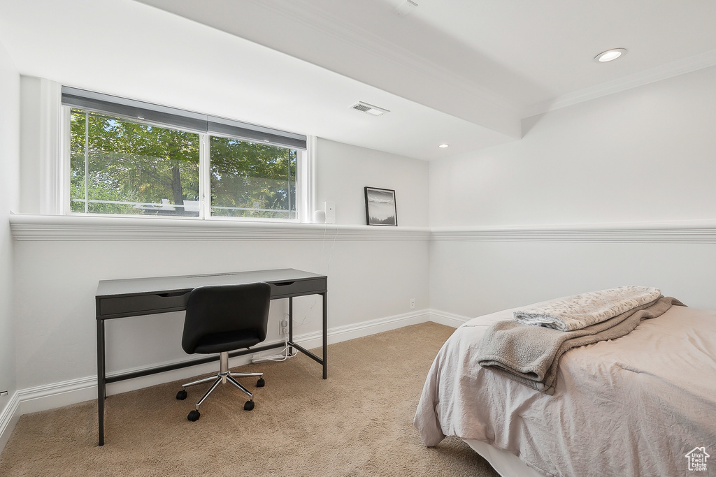 Bedroom featuring carpet floors, multiple windows, a desk, baseboards, and recessed lighting