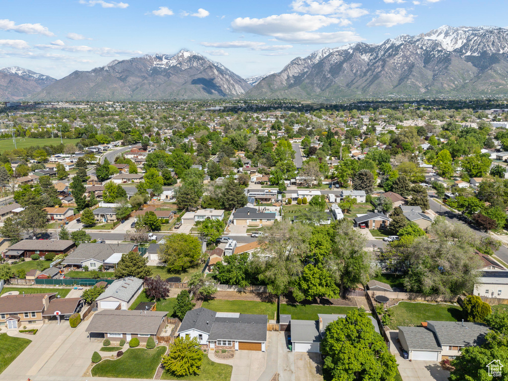 Aerial view of residential area with a mountain backdrop