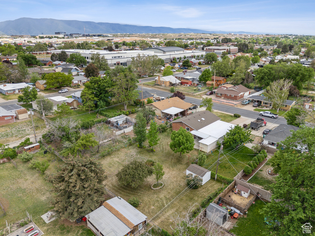 Aerial view of residential area with a mountain backdrop