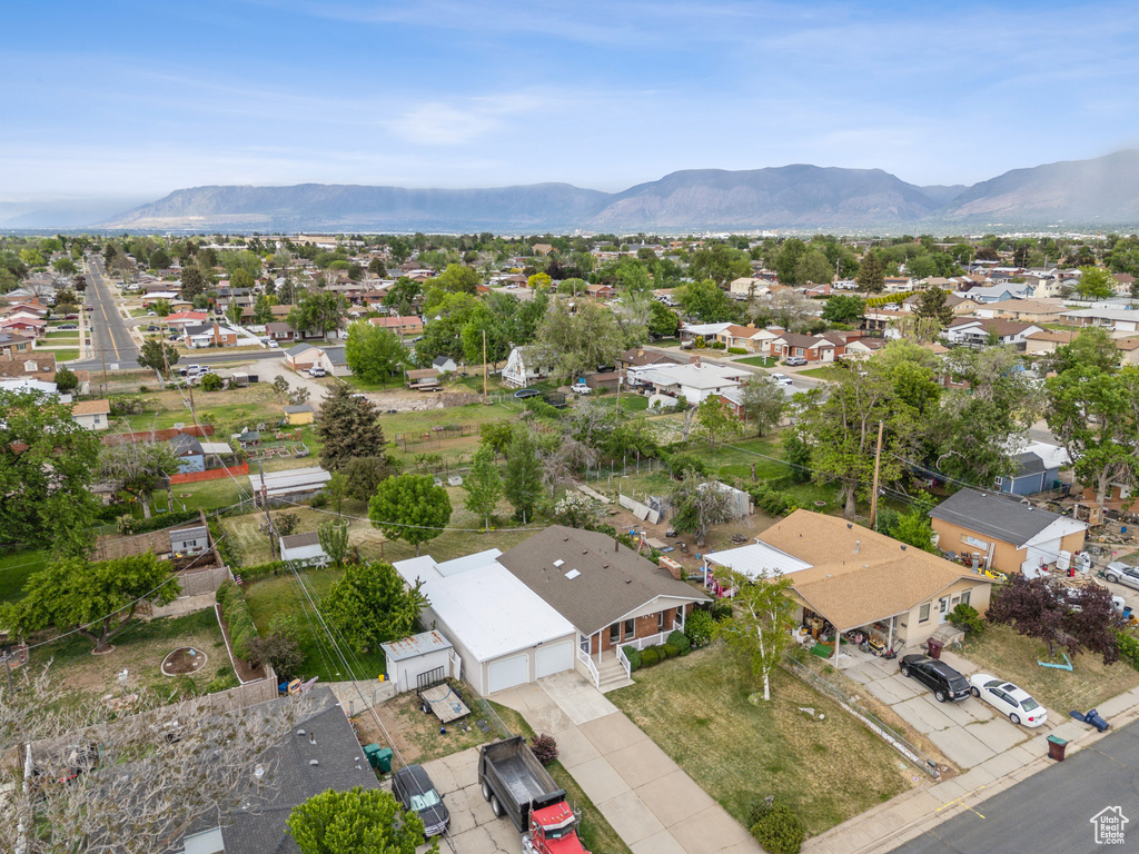 Aerial view of residential area featuring mountains