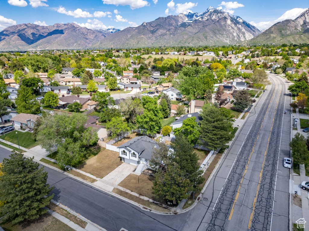 Aerial perspective of suburban area with mountains