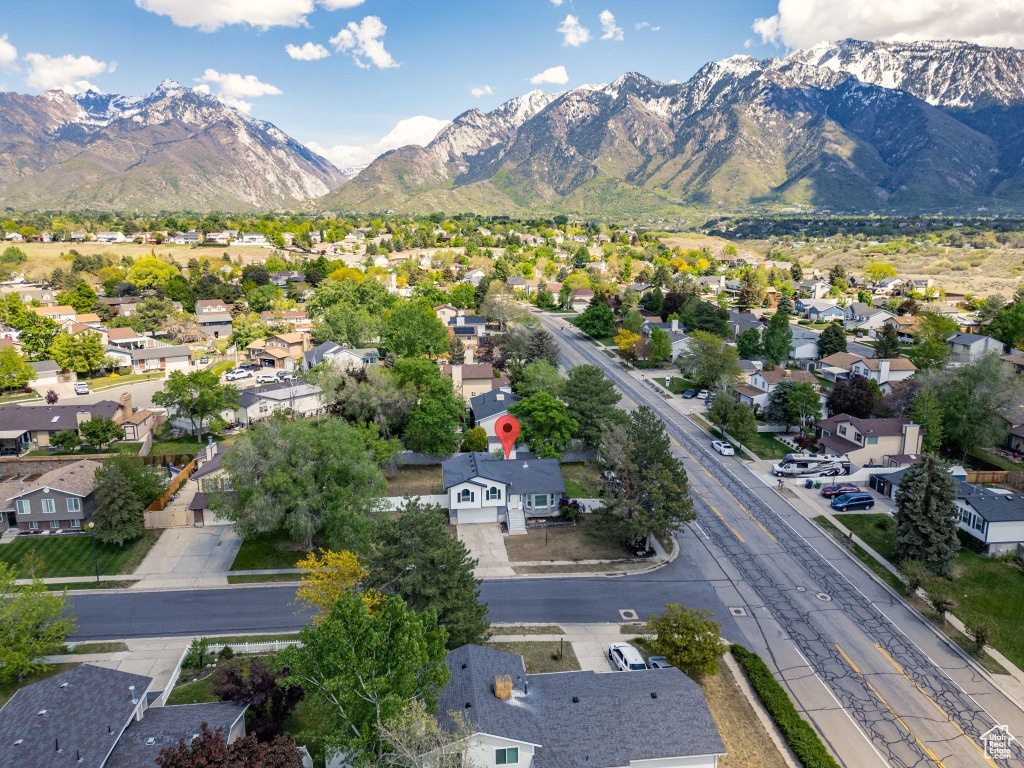 Aerial view of residential area with a mountainous background