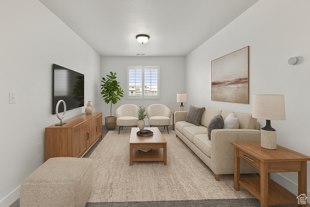 Living room featuring baseboards
