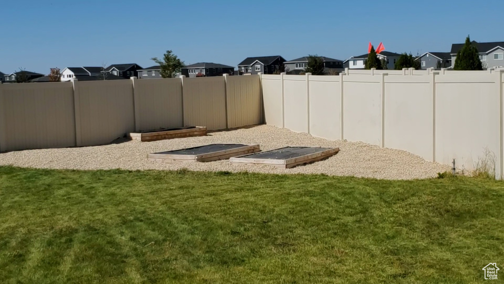 View of yard featuring a residential view