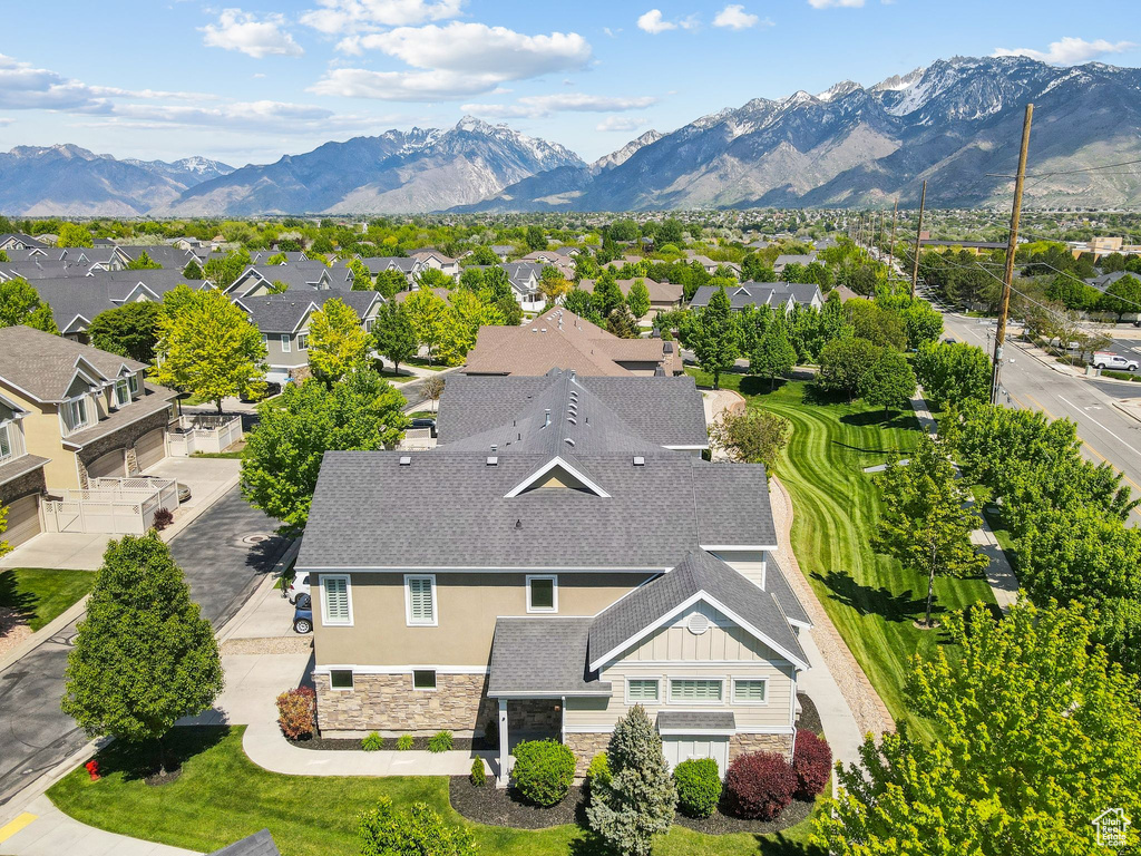 Aerial view of residential area with a mountain backdrop