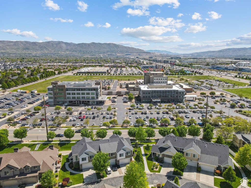 Aerial view of residential area featuring mountains