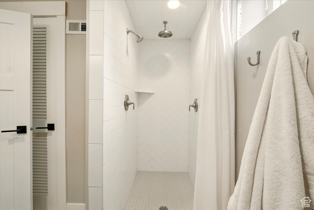 Full bath with a shower stall