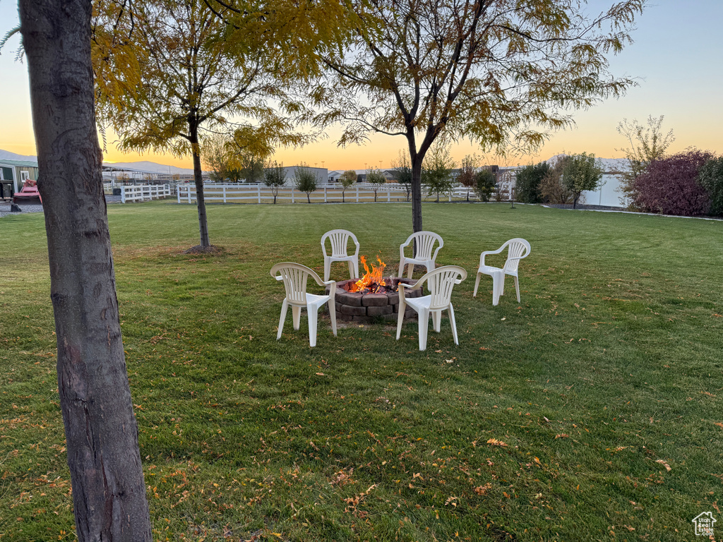 View of yard featuring a fire pit