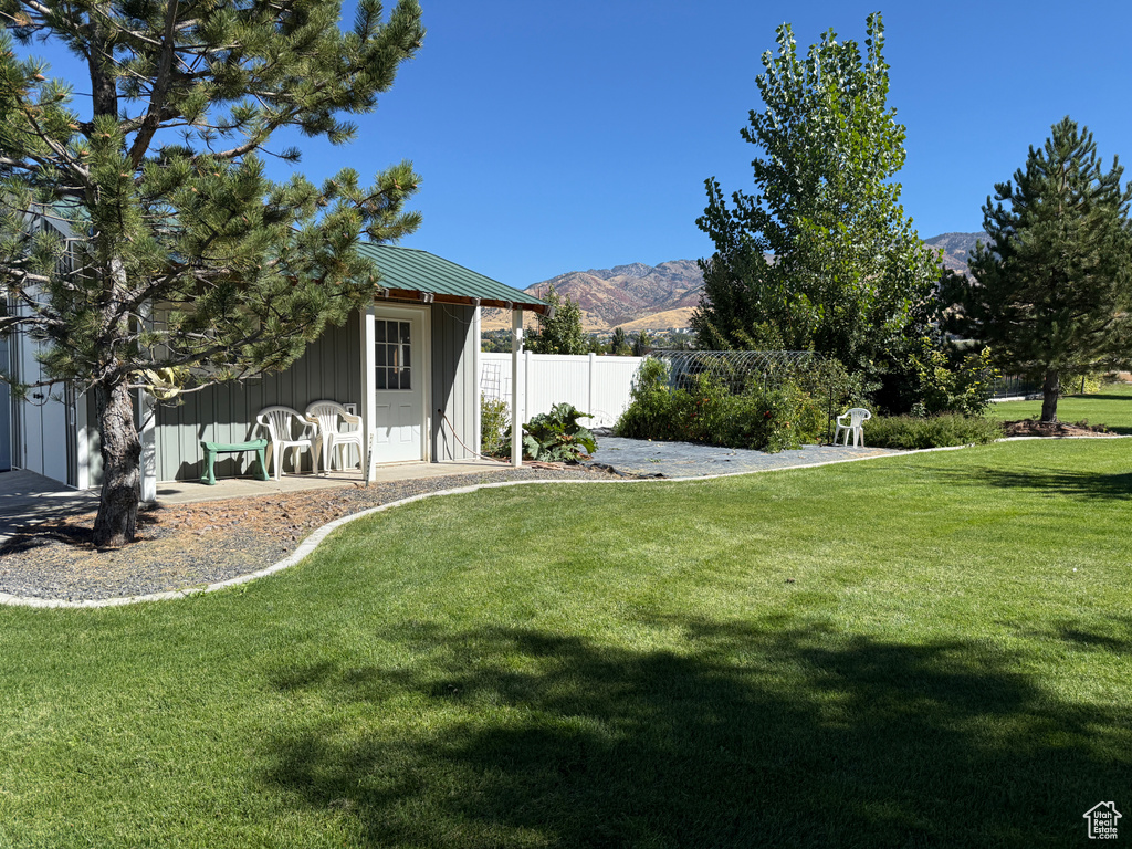 View of yard with a mountain view