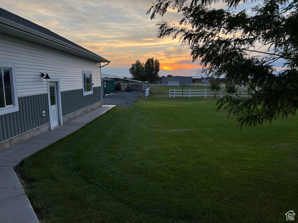 View of yard at dusk