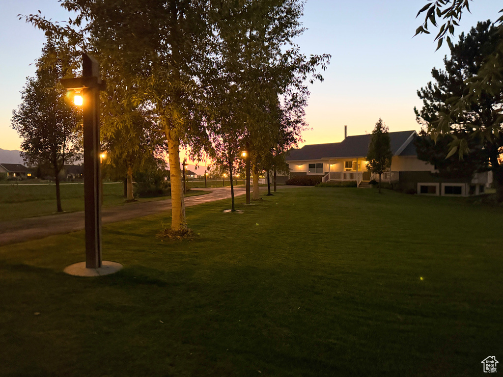 View of home\\\\\\\'s community featuring a yard
