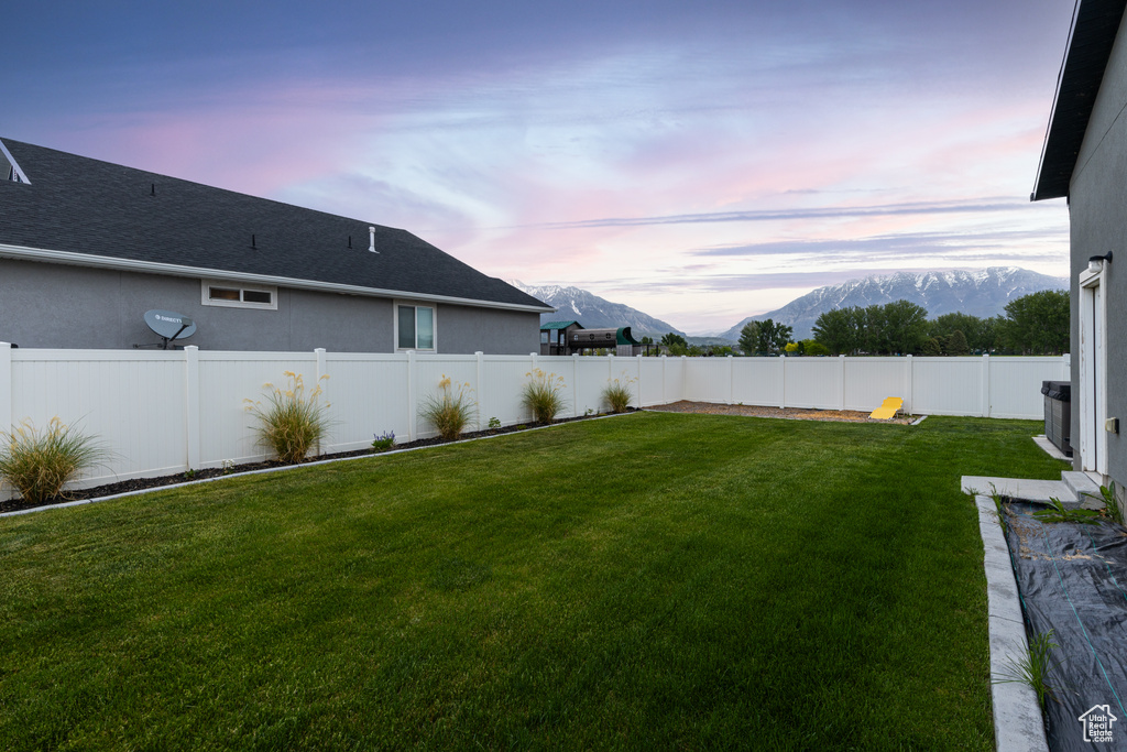 View of yard with a mountain view