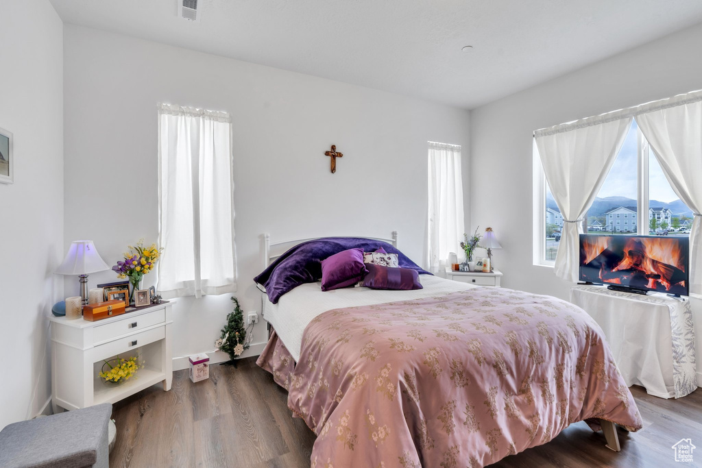 Bedroom featuring wood finished floors